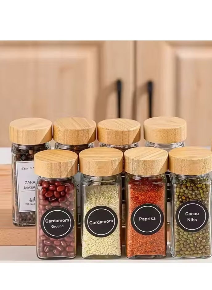 24 قطعة من برطمانات التوابل الزجاجية الفارغة توابل مربعة للاعشاب والتوابل لتخزين وتنظيم المطبخ بالأغطية وقمع للتعبئه وملصقات باللغه العربية والانجيليزية - Image 1